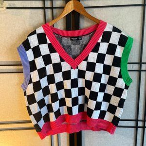 Preppy style sweater vest bright colours geometric patterns